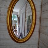 Miroir ovale doré