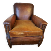 Old studded leather club chair 1930-1930