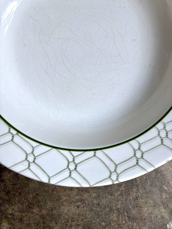 Grand plat rond creux Christian Dior en faïence italienne