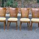 Four 20th-century Directoire-style chairs in solid wood with cane seats and beige fabric
