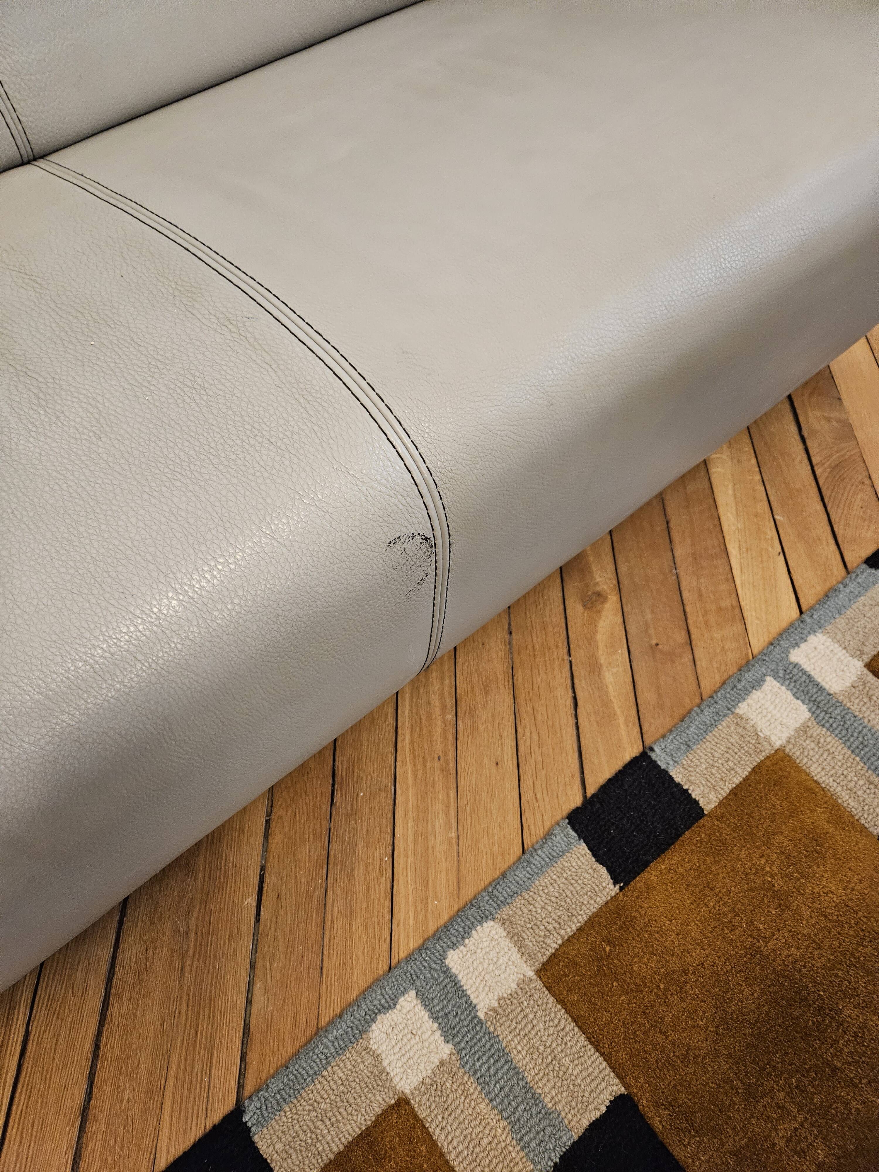 3-seater sofa, 2-seater sofa and an armchair in grey leather by Calia Italia.