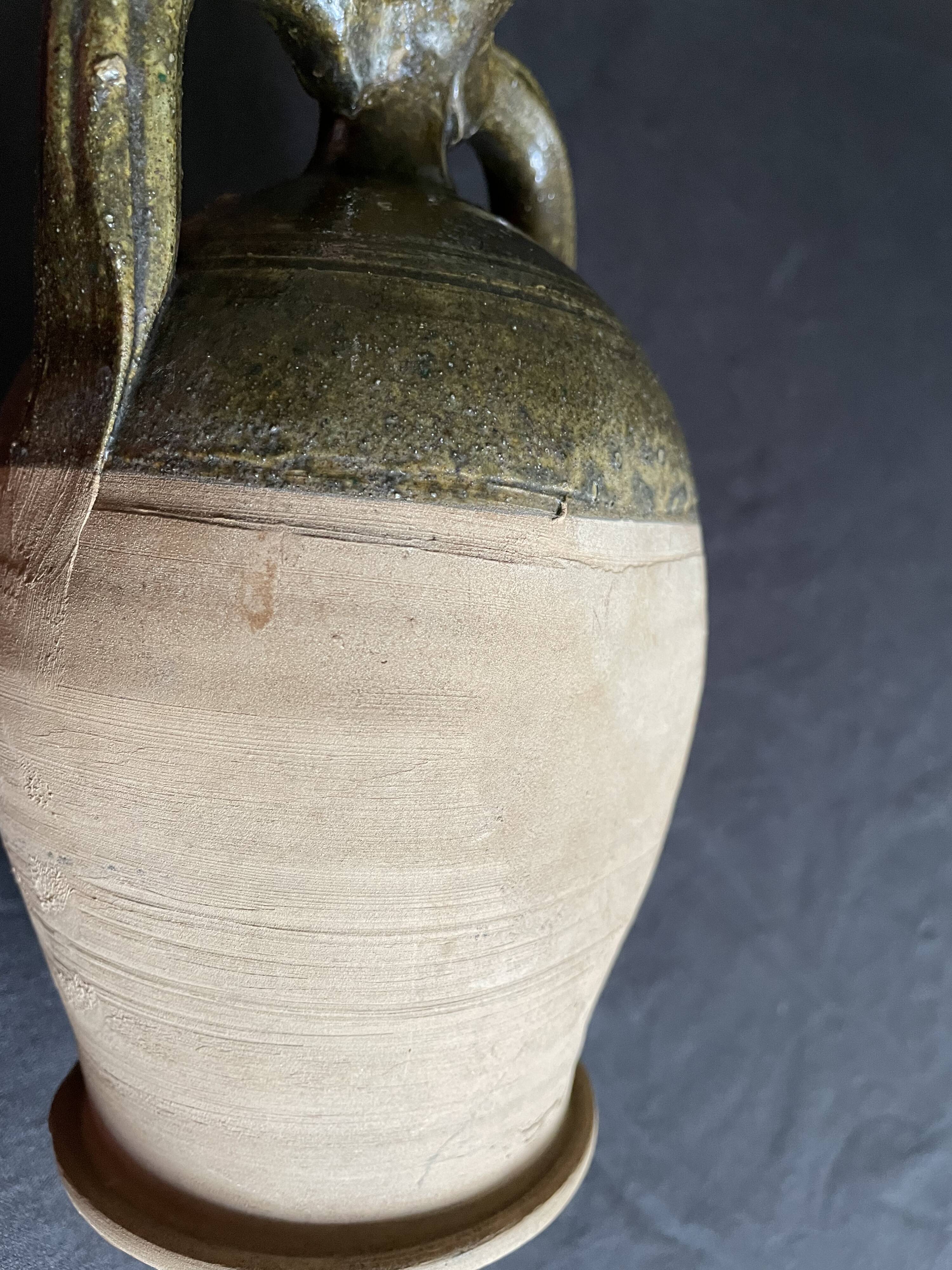 Persimmon glazed terracotta oil jar