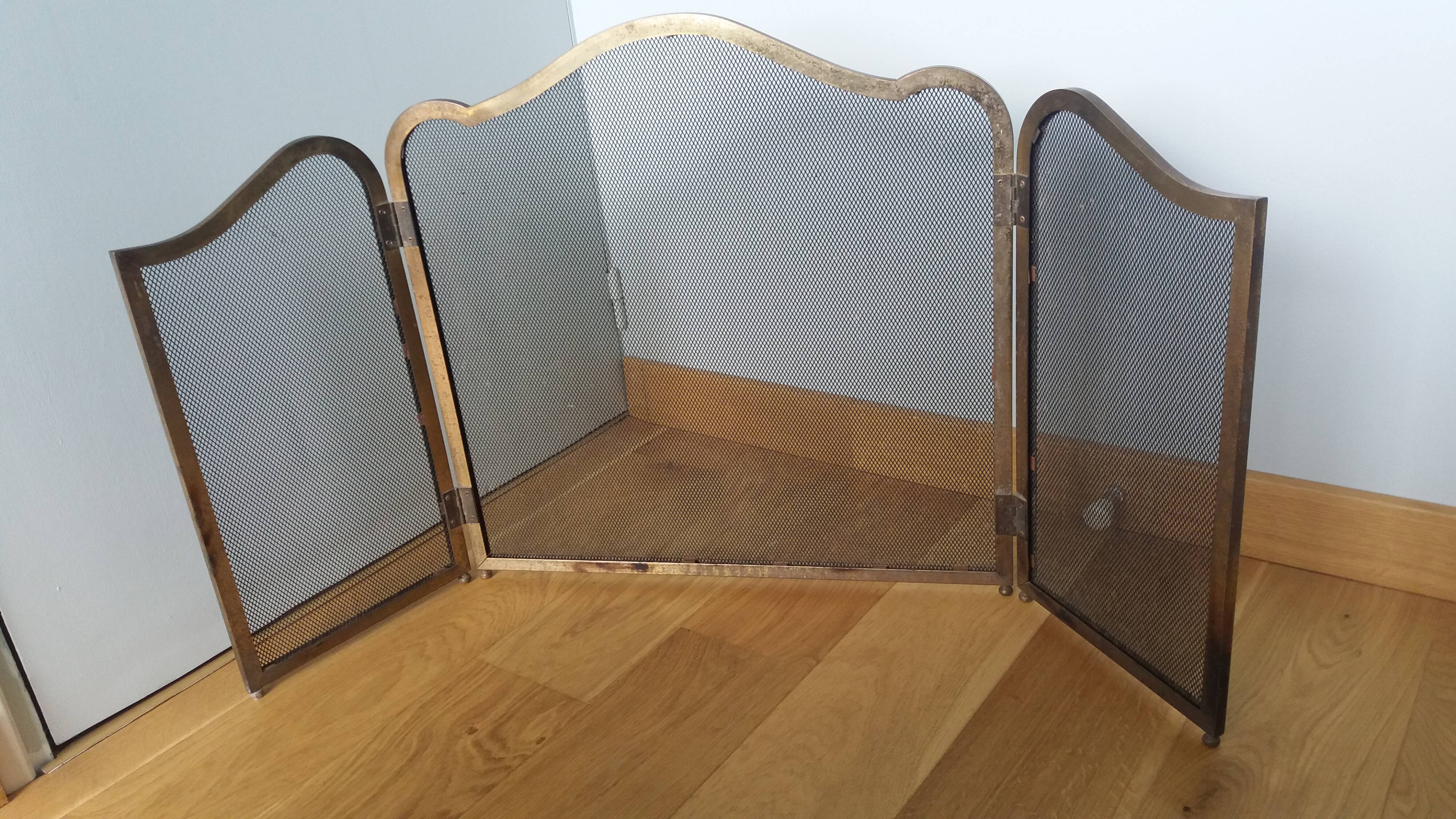 Fire screen, three-panel fireplace screen.