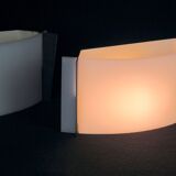 Pair of mid-century wall lamps in black metal and perspex, france