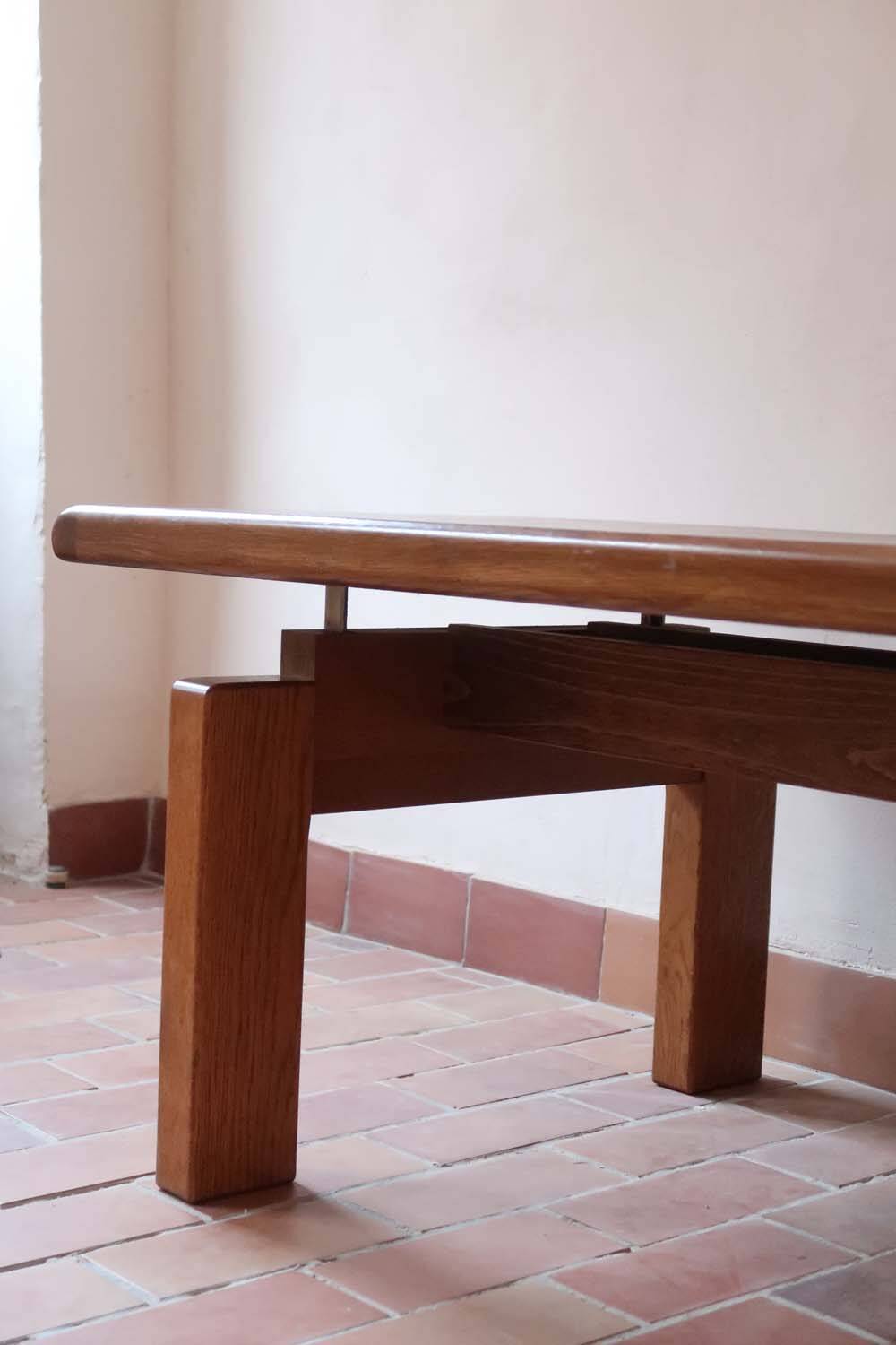 Large solid retractable coffee table