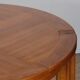 Round extendable dining table in wood published by Monopoly, 1970.