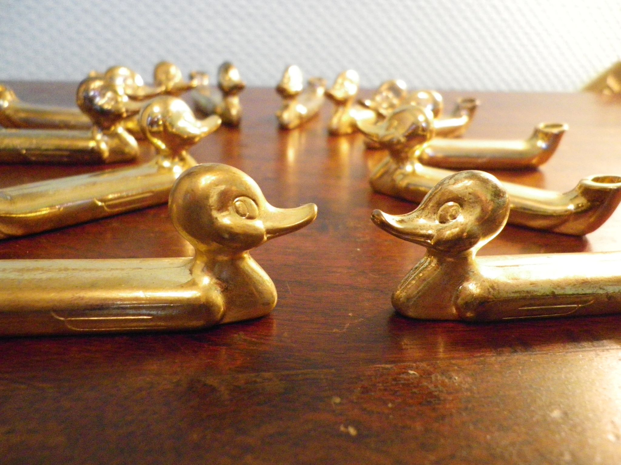 Box of 12 knife holders in silver metal, shape of canrds, 60s