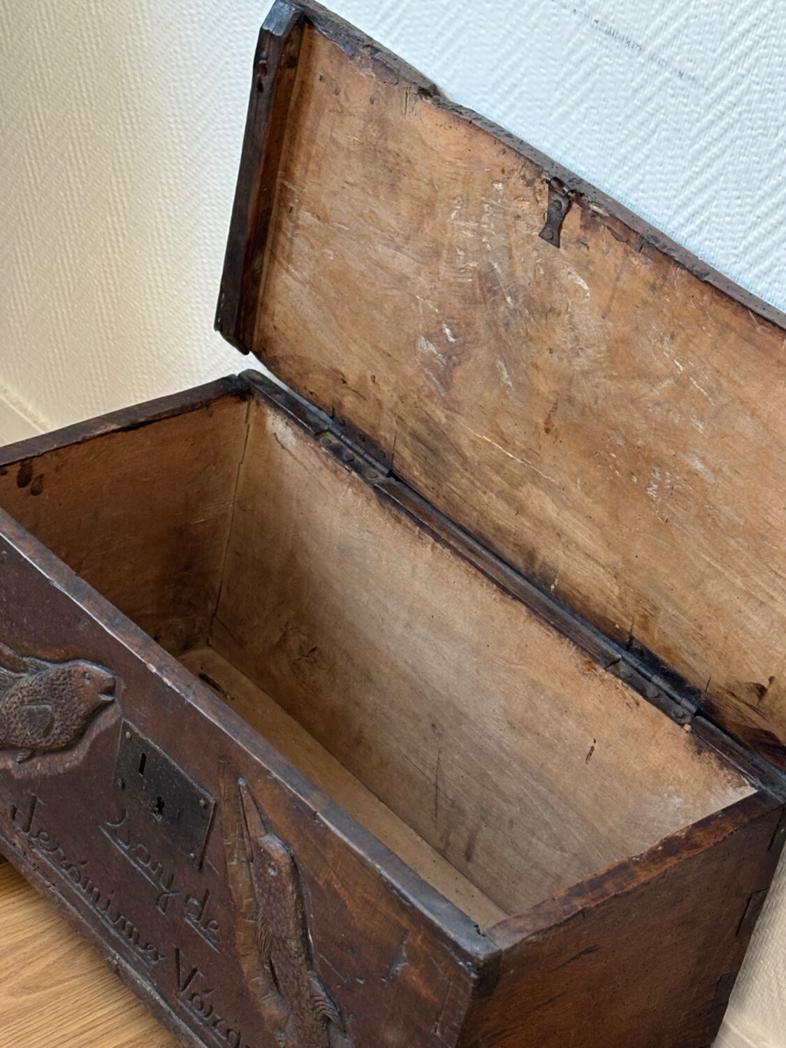 Old Spanish chest with a carved inscription — “I am from Jerónimo Vázquez”