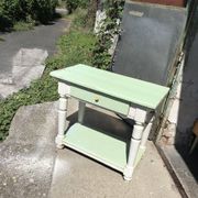 Rustic wooden dining table painted white and pale green, with a central drawer, 1950s.