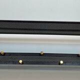Coat rack in black lacquered metal, perforated sheet metal and brass in the style of Mathieu Matégot
