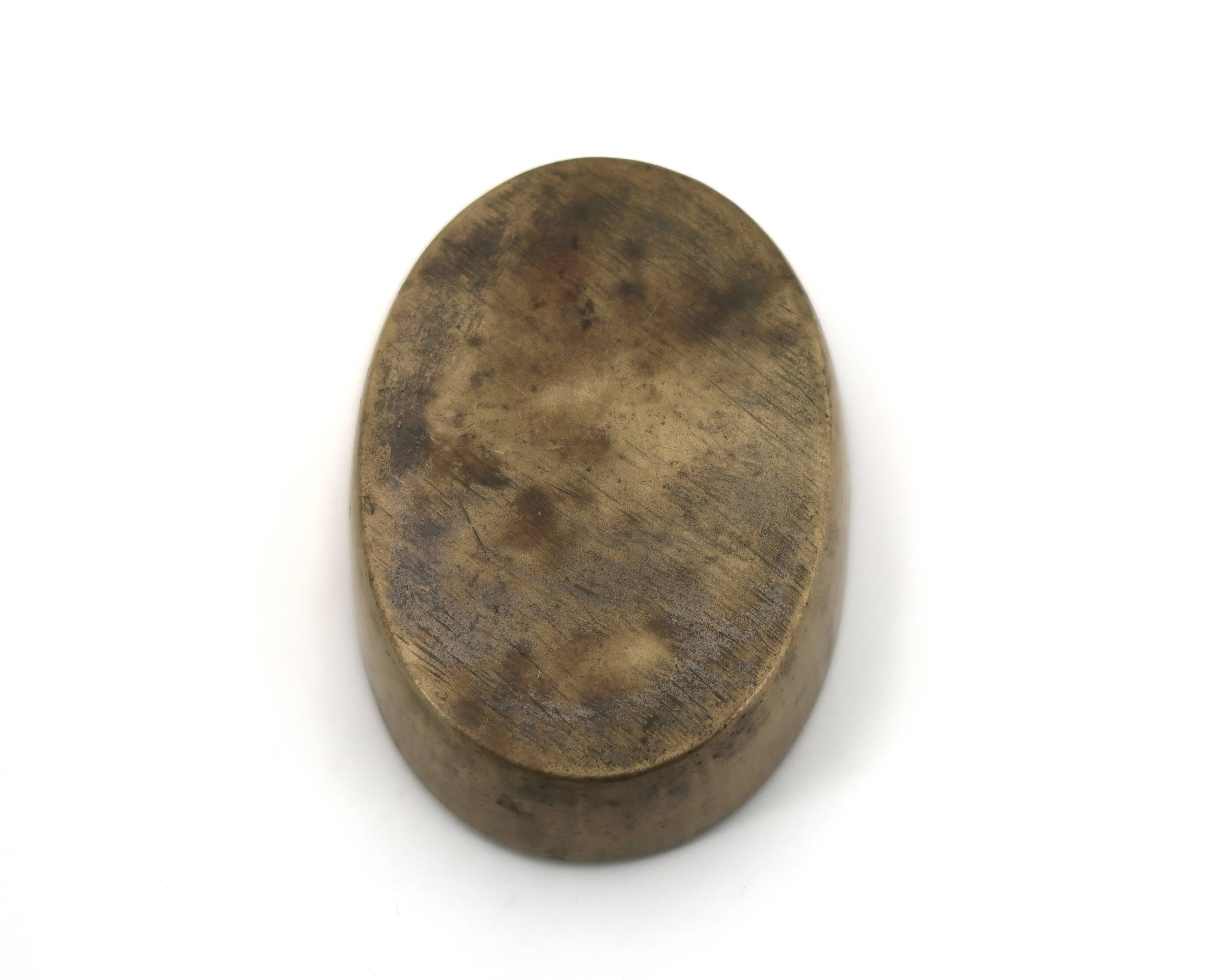 Brass catchall, face of an Indian woman, 1970s.