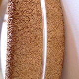 Round mirror on inclined cylindrical support