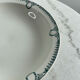 Shallow dish St Amand decorated with green crowns.