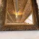 Antique Louis XV style mirror in gilded stucco.