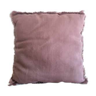 Border fringed edge and off-white linen cushion