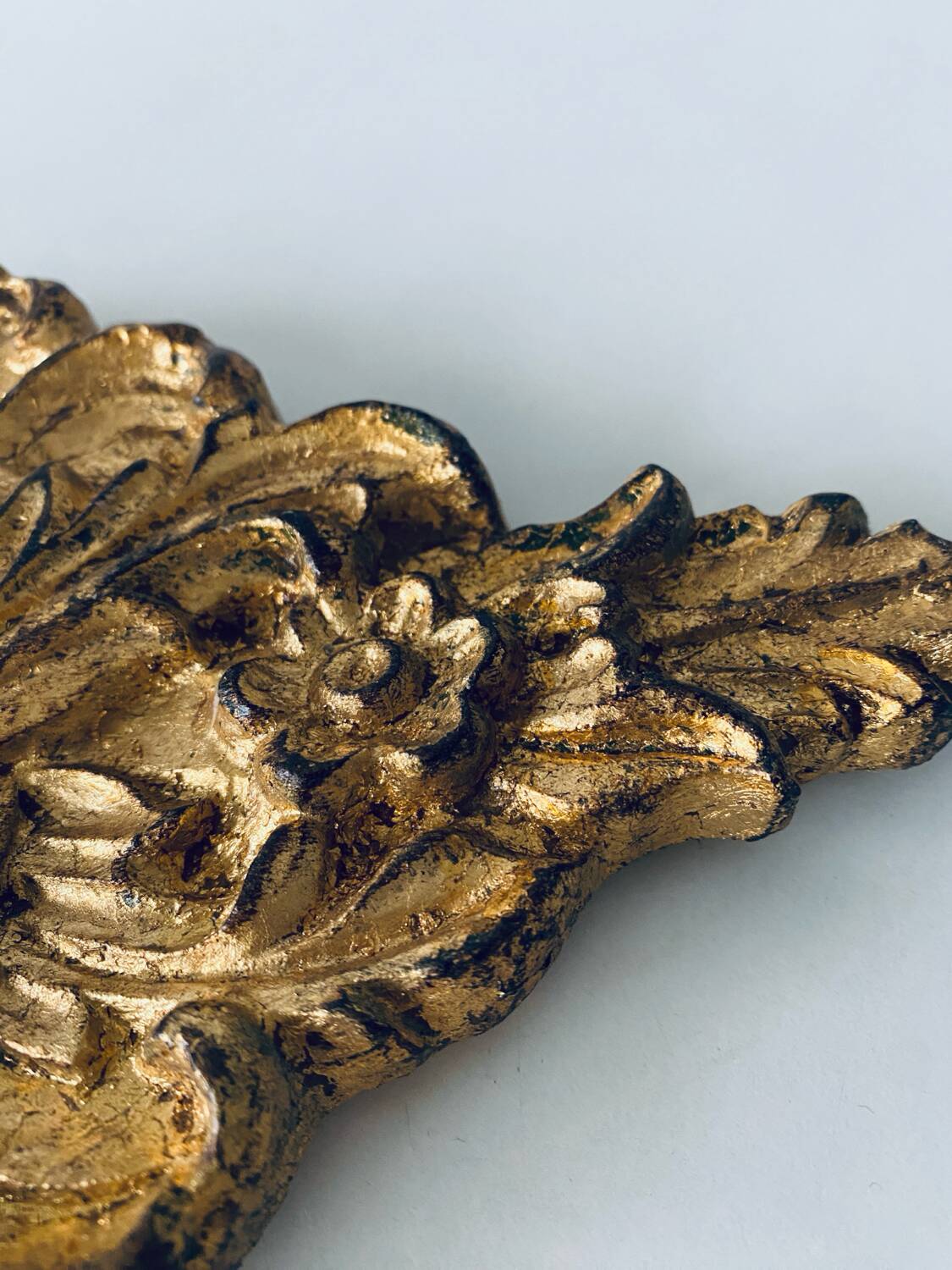 Gold wall candle holder