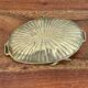 Empty brass snail pocket