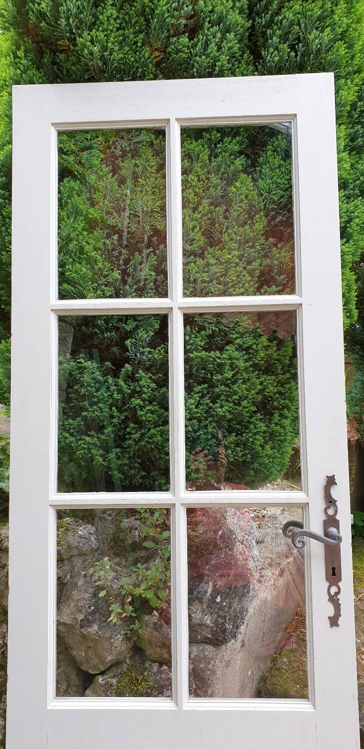 Old wooden door with small squares