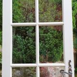 Old wooden door with small squares
