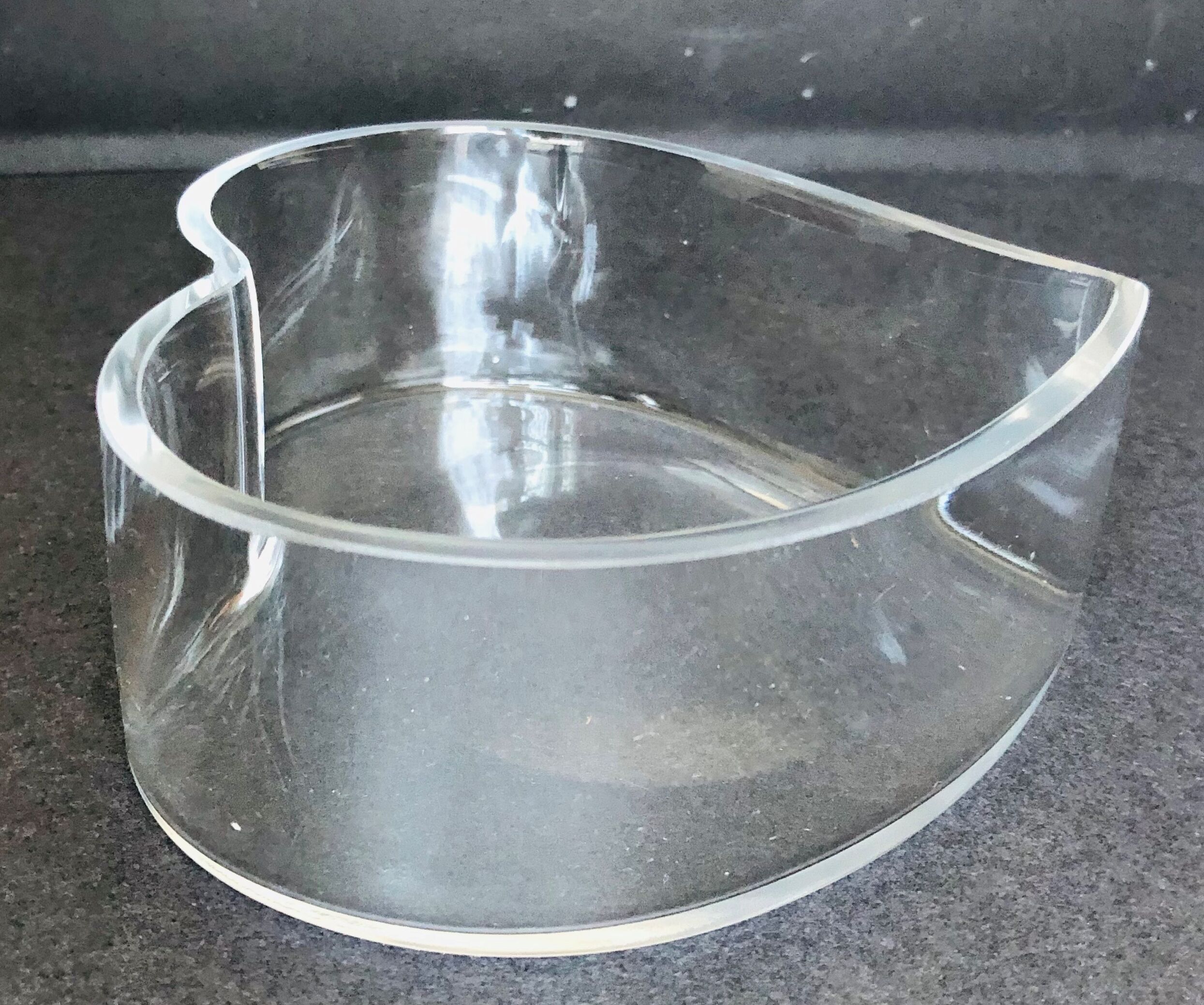 Empty glass heart-shaped pocket