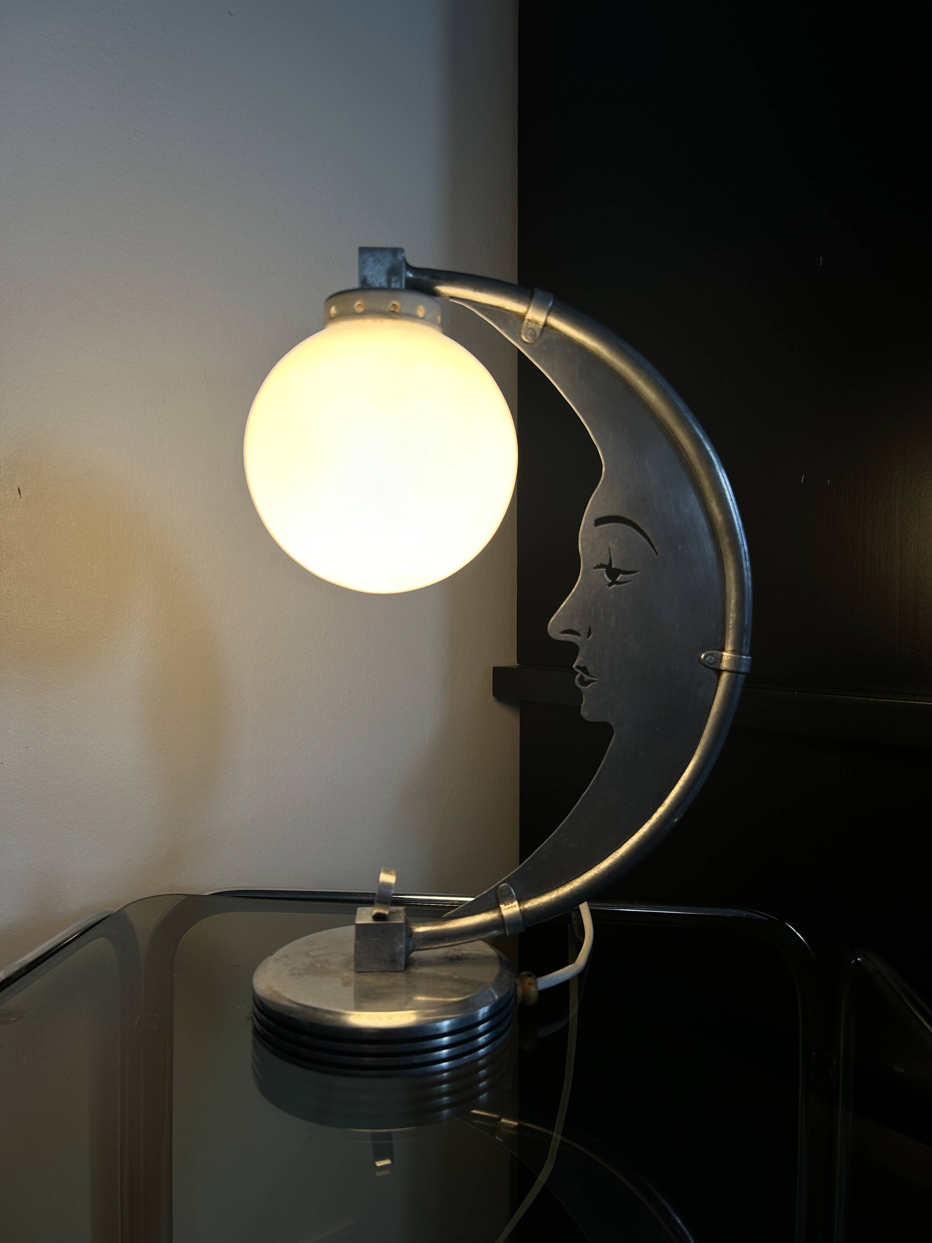 Moon lamp with face in aluminum and white opaline circa 1930