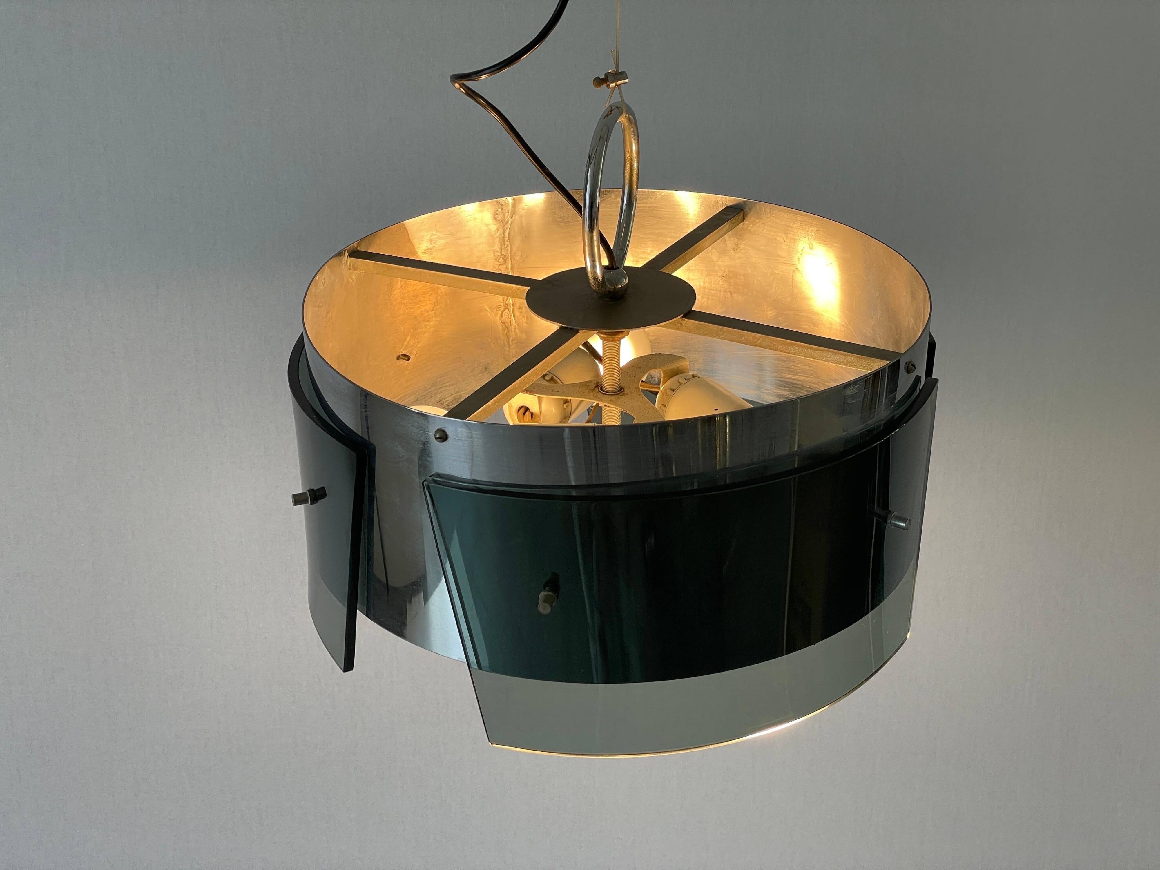 Suspended lamp in green glass and chrome, 1960s, Italy