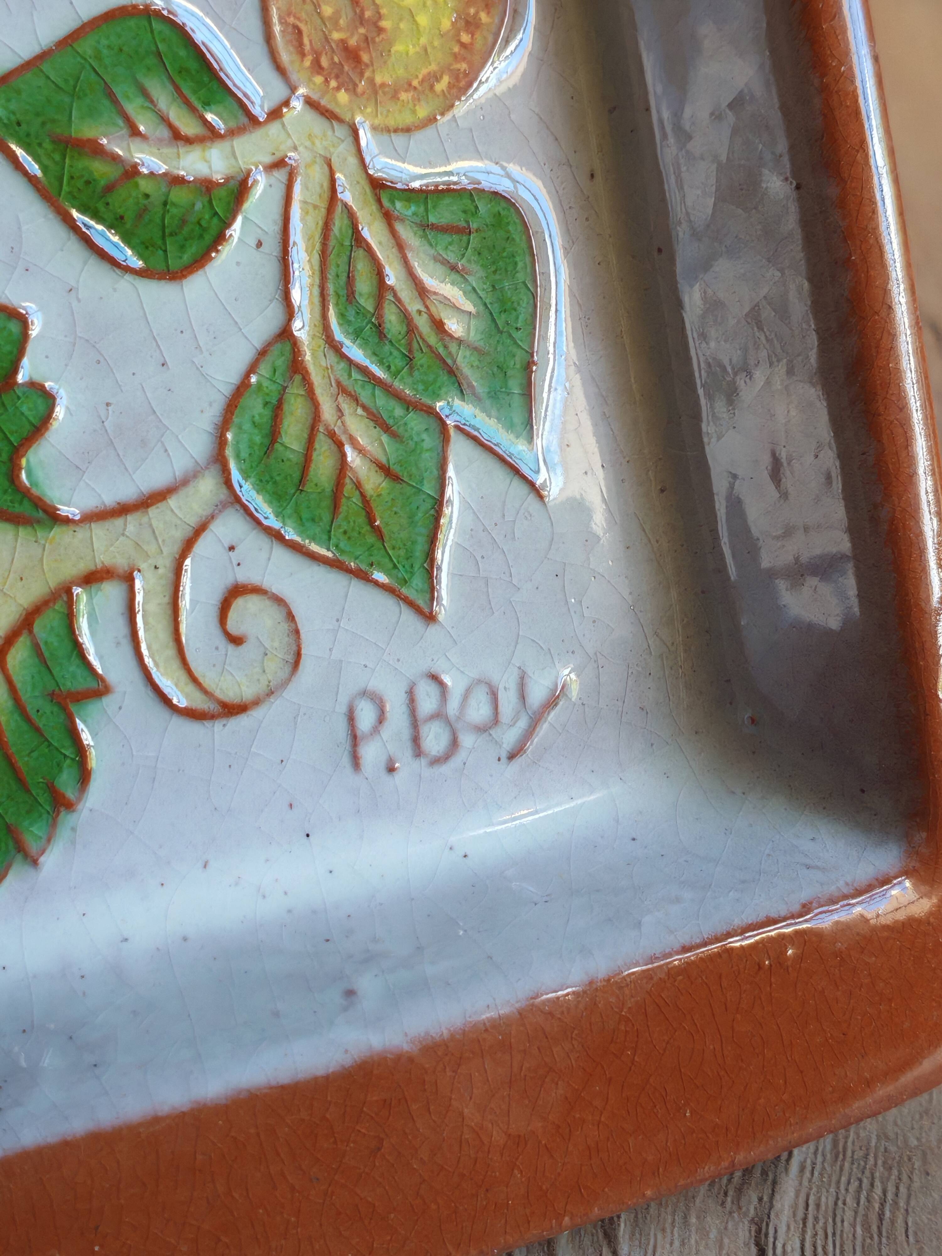 Terracotta plate signed P.Boy, glazed artisanal ceramics.