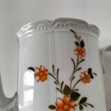 Vintage coffee pot Winterling Bavaria with orange floral decoration.