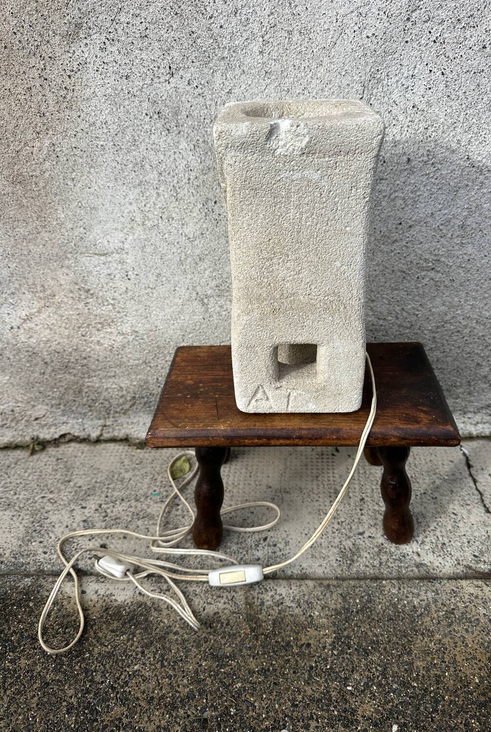 Anthropomorphic stone table lamp brutalised by Albert Tormos.