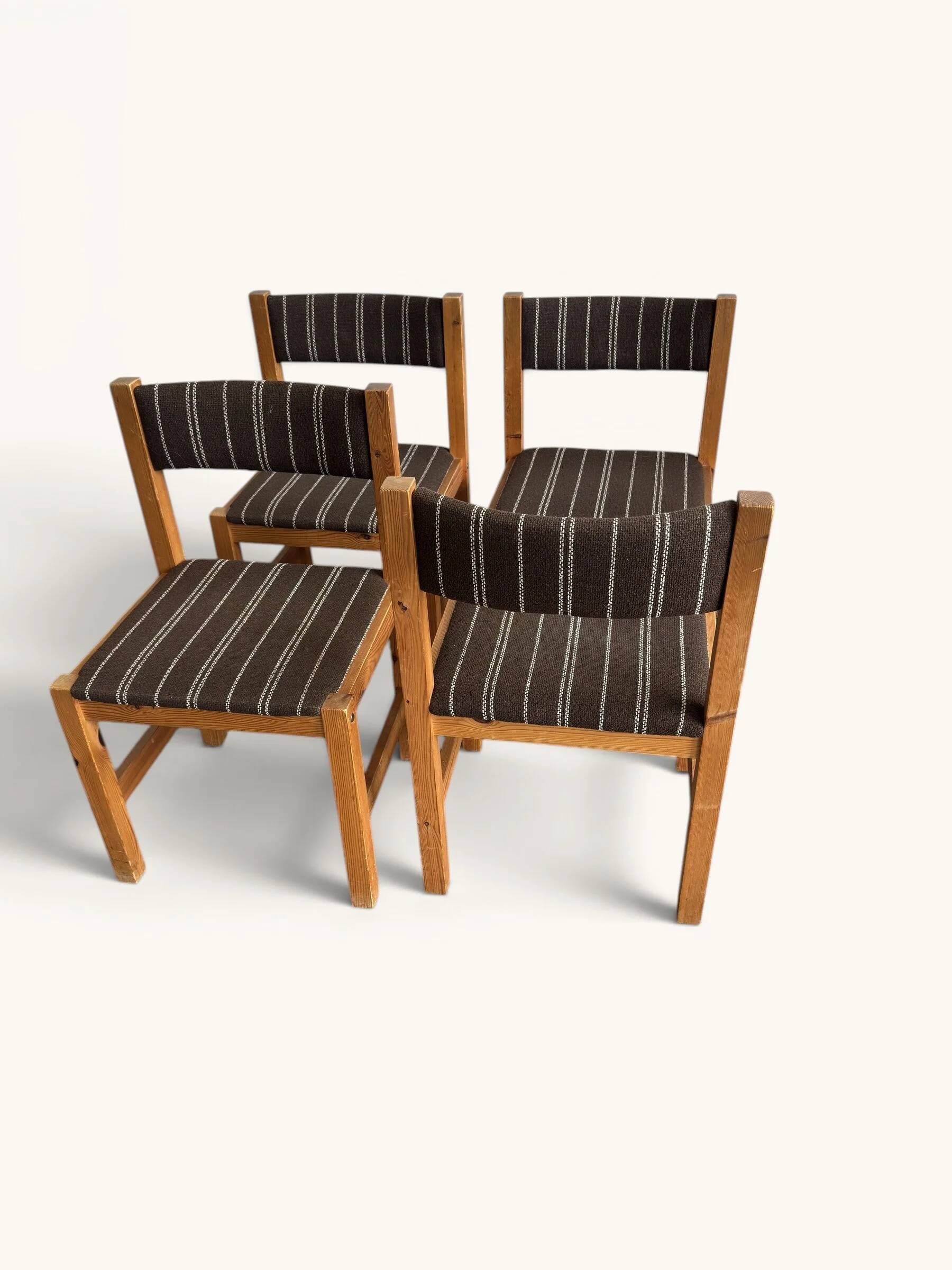 Set of 4 Danish dining chairs with brown striped upholstery.