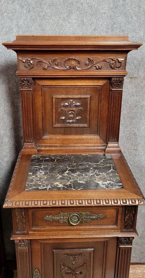 Pair of Renaissance style bedside tables in carved walnut, 19th century