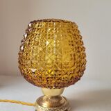 Bedside lamp in amber glass and brass
