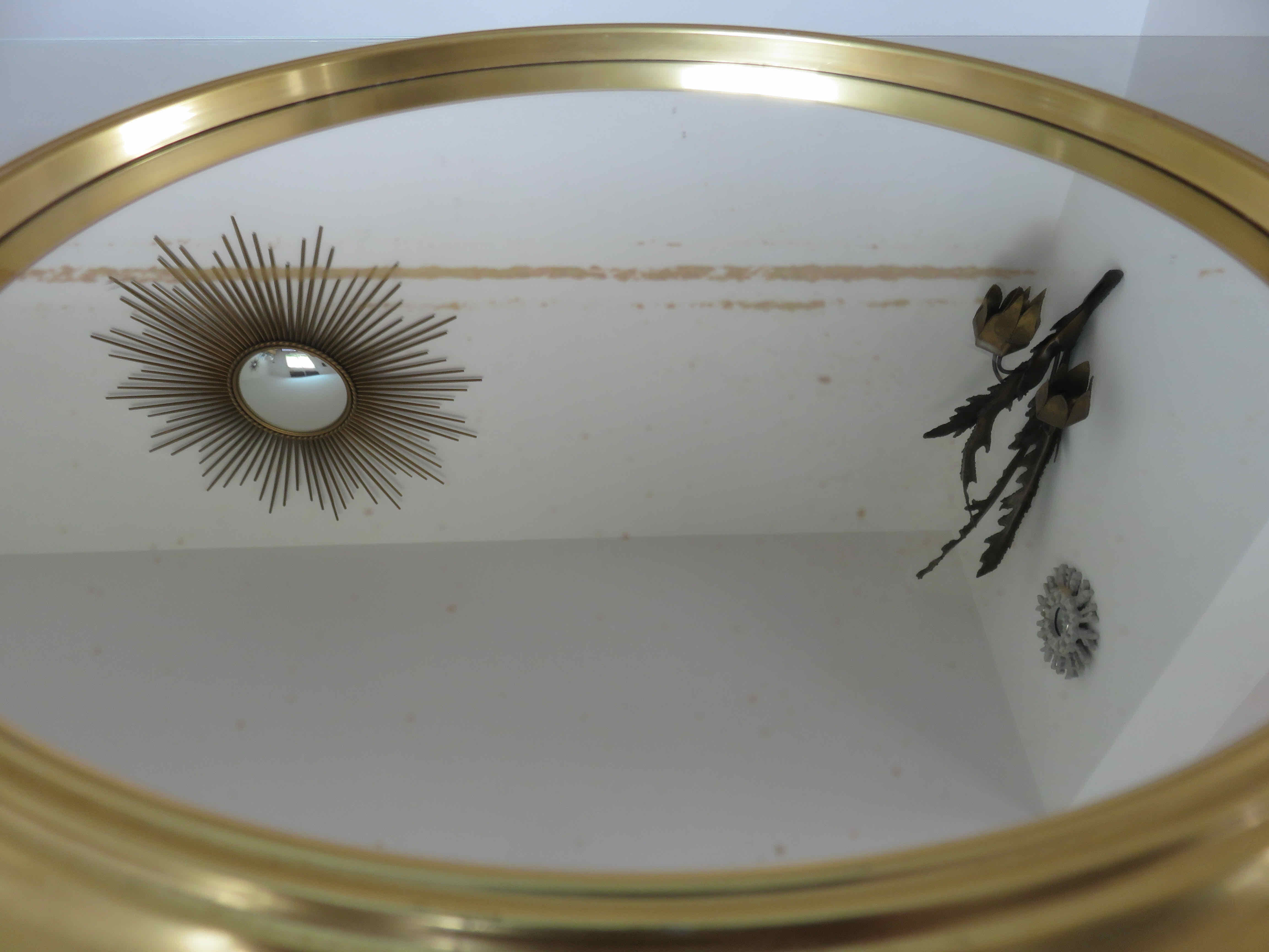 Round mirror top in gilded aluminum art deco