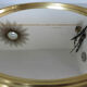 Round mirror top in gilded aluminum art deco