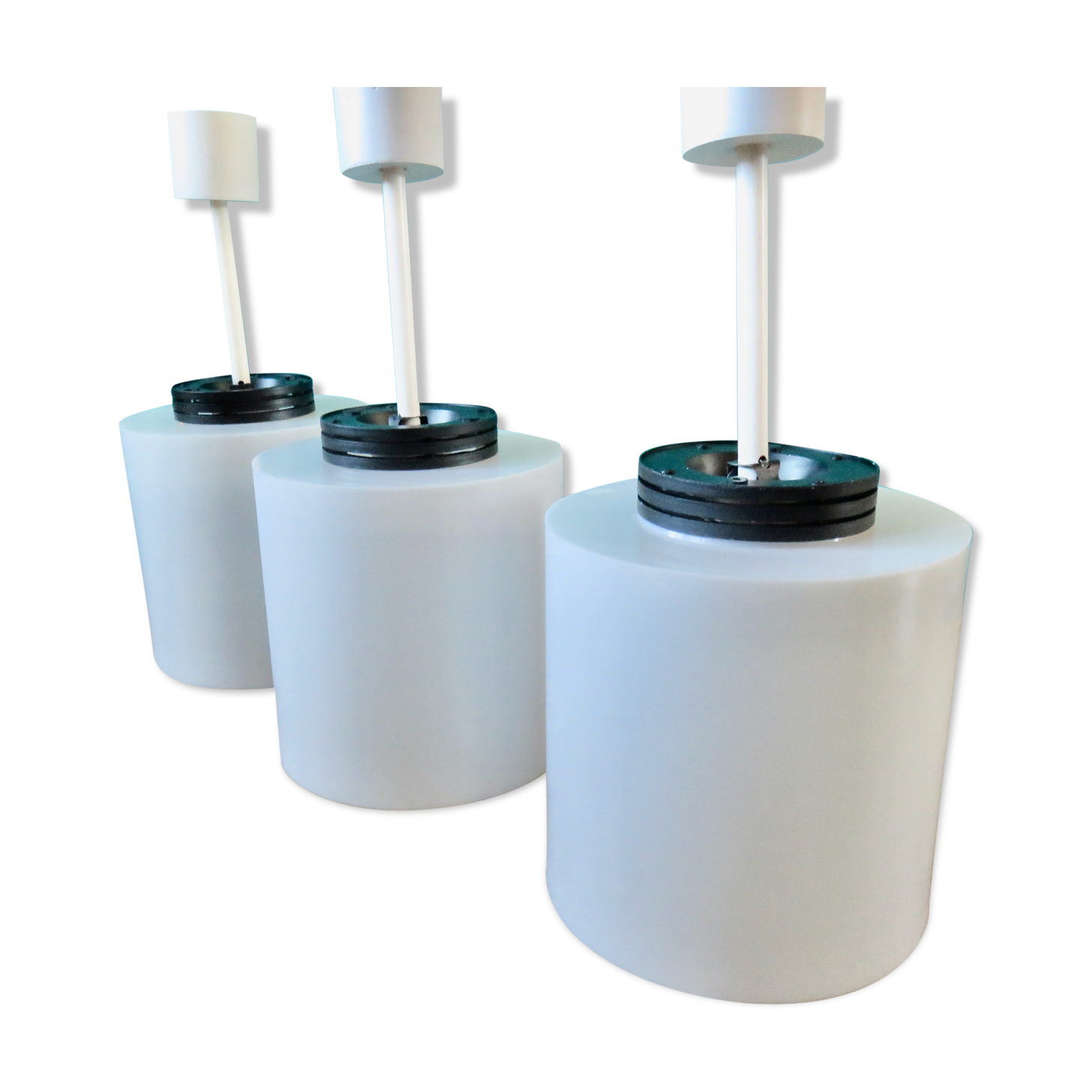 Three cylindrical suspensions in white resin, France 1970.