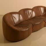 "Pumpkin" 3-seater canapé in patinated brown leather by Pierre Paulin for Arti.