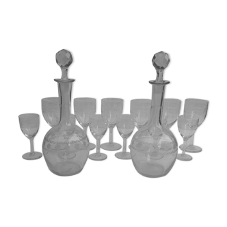 Lot de 12 verres et de 2 carafes en cristal