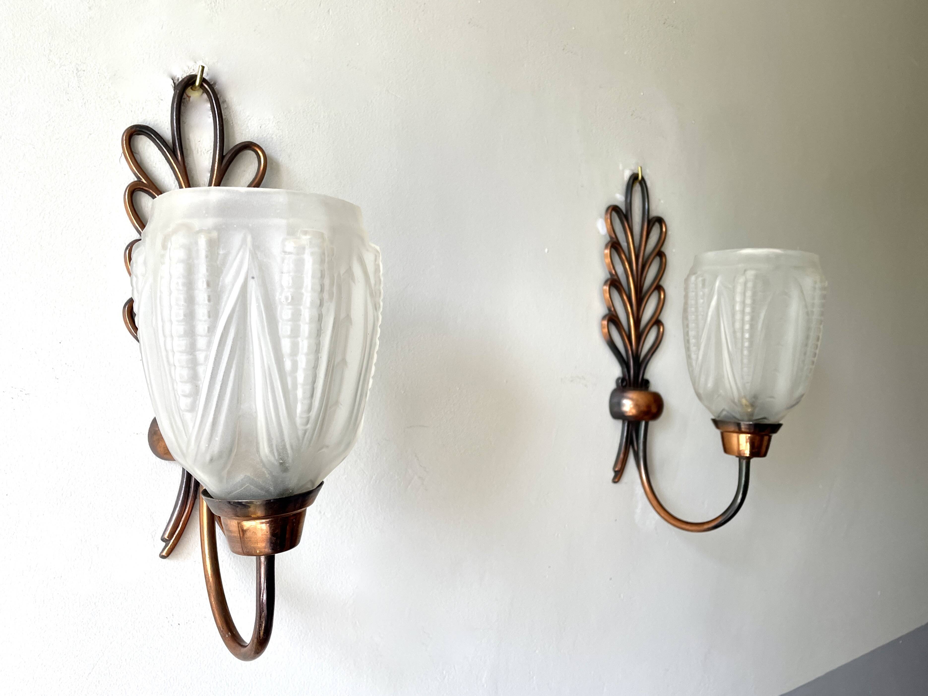 Pair of Art Deco wall lights, copper and frosted glass