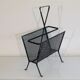 Magazine holder by Mathieu Mategot