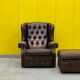 Brown leather chesterfield wing chair with Ottoman
