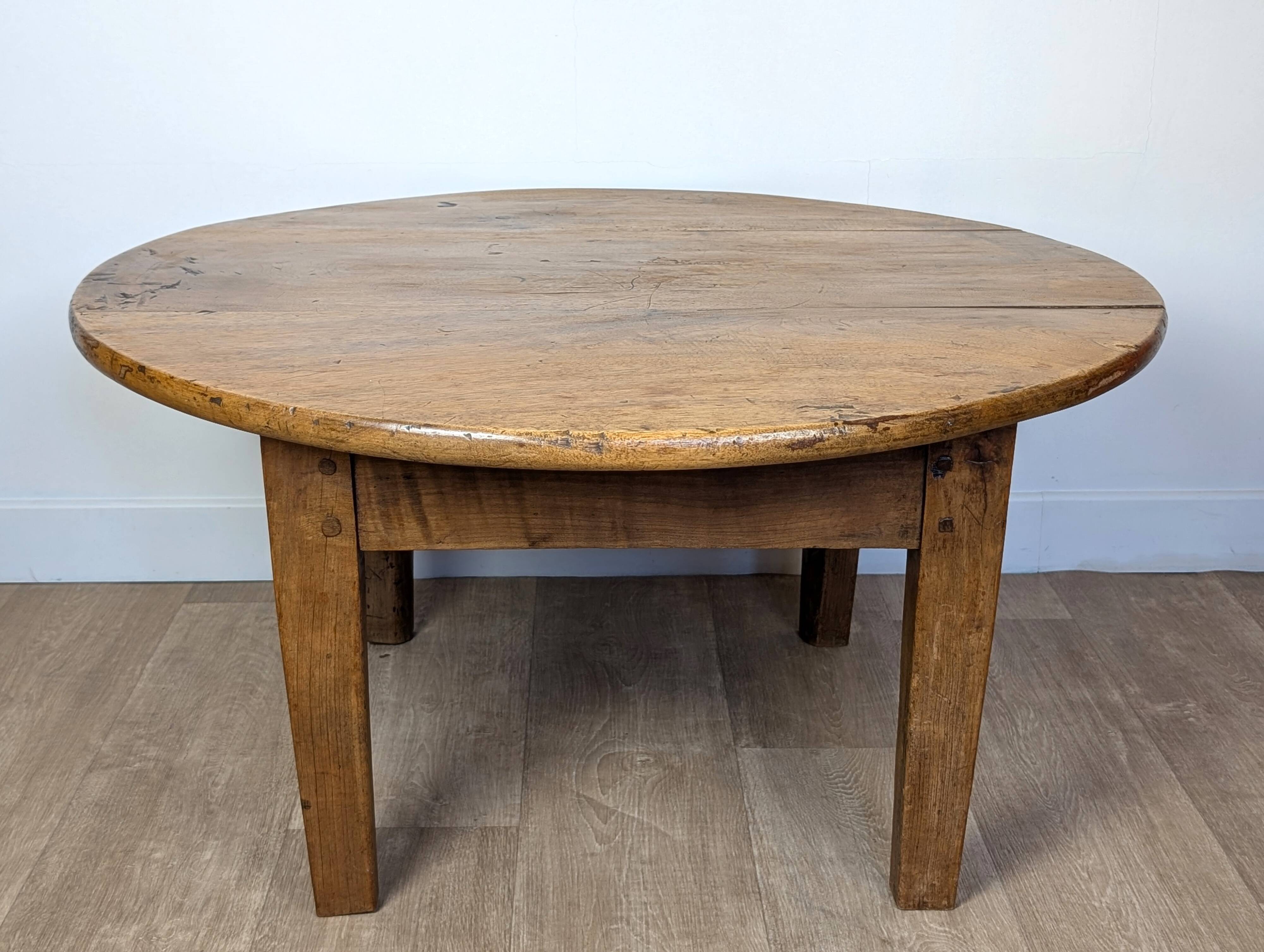 Round walnut coffee table