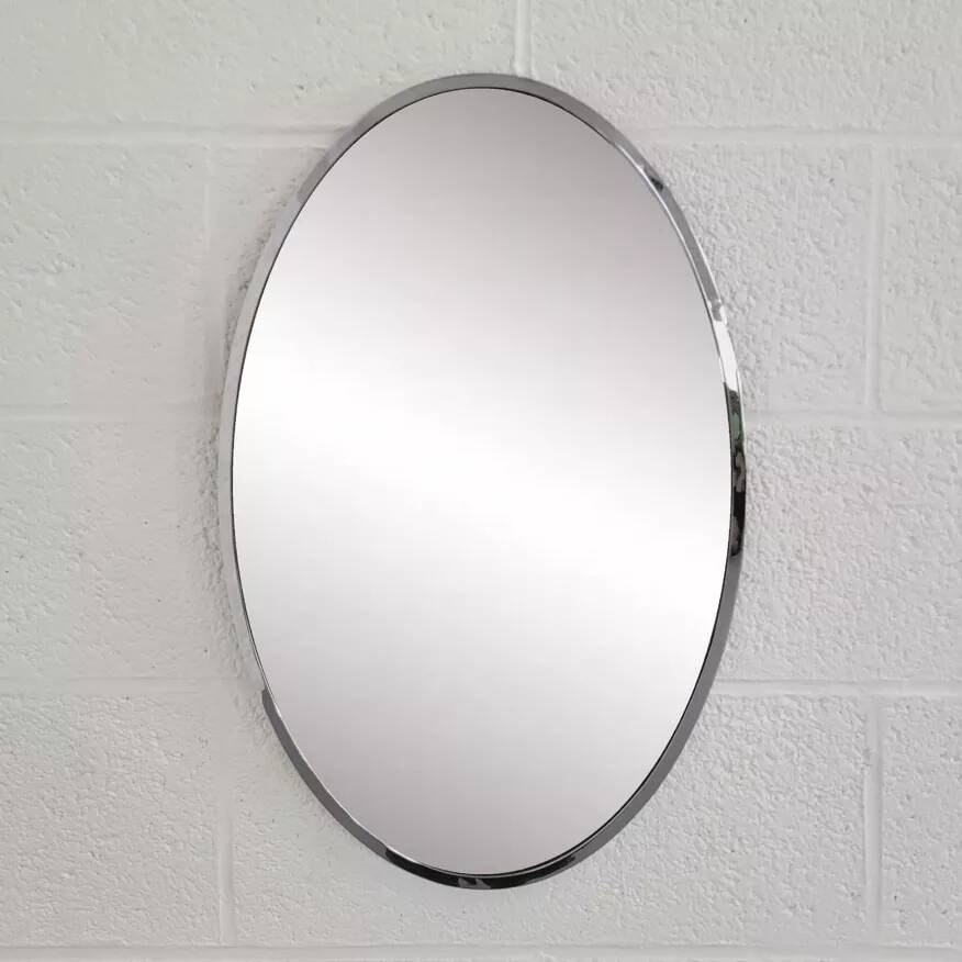 Oval mirror from the 1960s with a chrome frame.