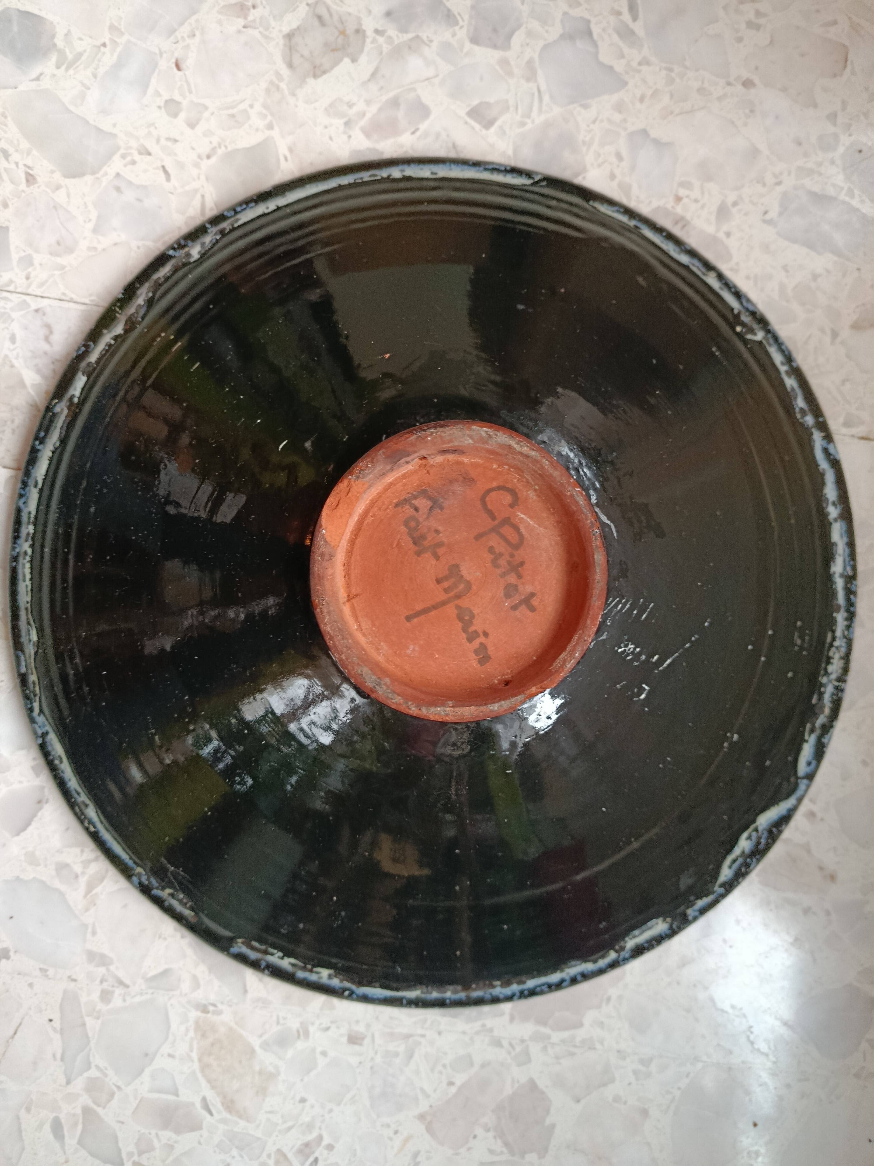 Large stoneware platter signed c. pitot, mid-20th century, black, white, and red glazed ceramic