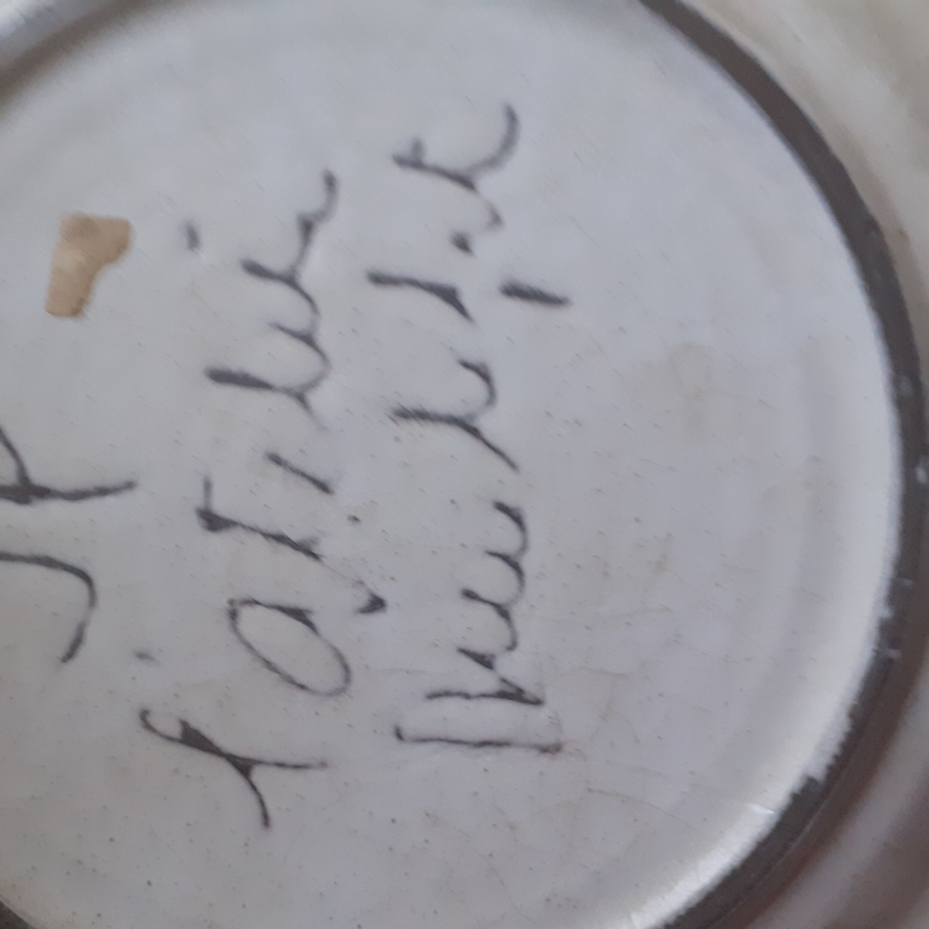 Faience plate. The workshop. JP.