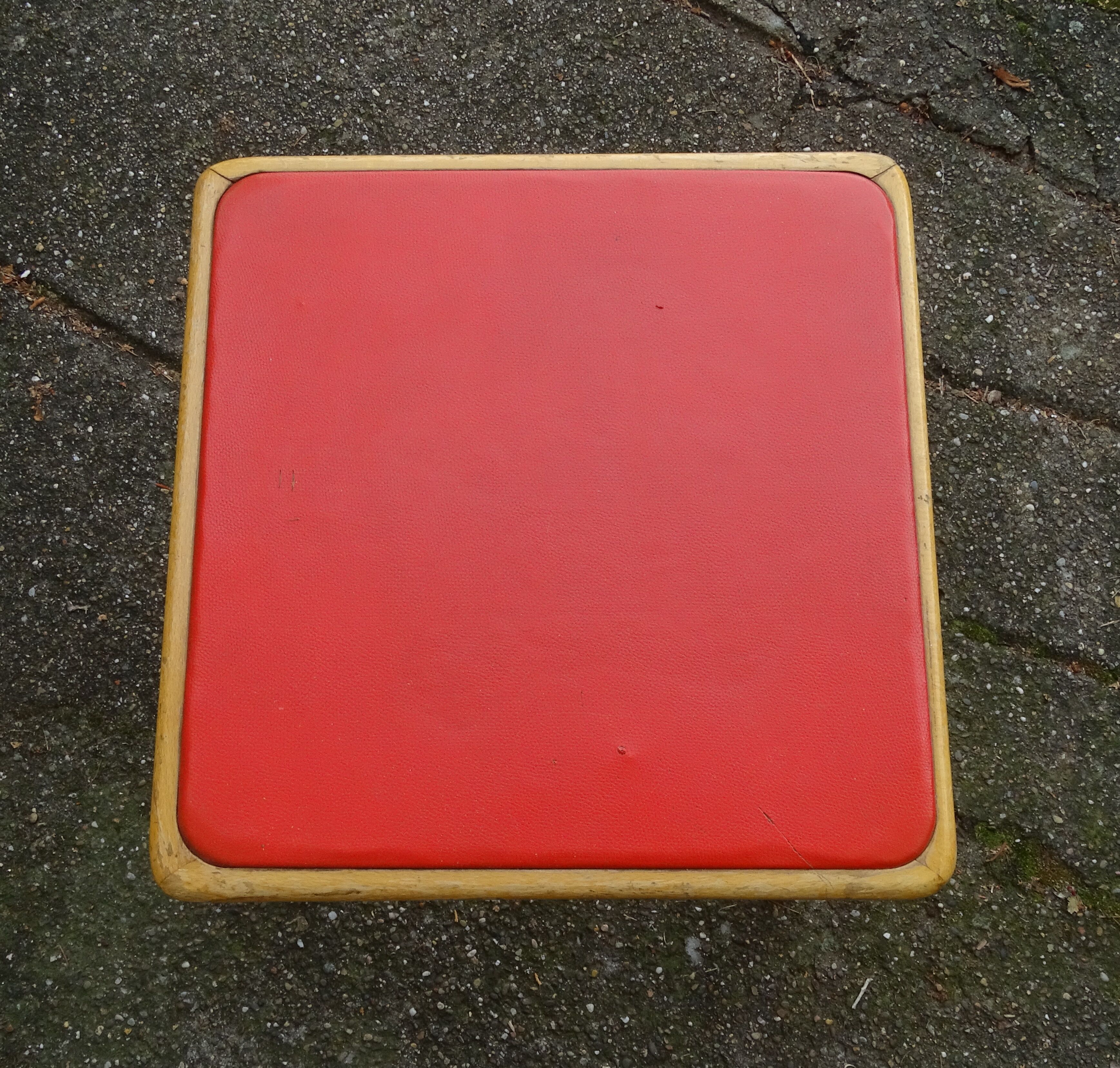 Square Baumann stool from 1970 in red skai