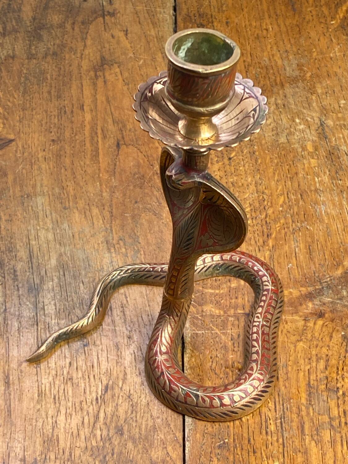 Chiseled brass cobra candlestick