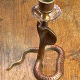 Chiseled brass cobra candlestick