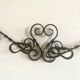 Old wrought iron coat rack