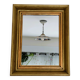 Antique mirror in gilded and copper wood