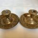 Pair of cave rat candlesticks with brass masks.